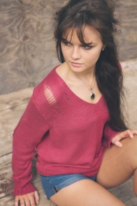 UK fashion blogger wearing handknit ladder sweater and denim shorts