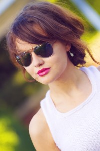 UK fashion blogger wearing primark sunglasses and white racer back top