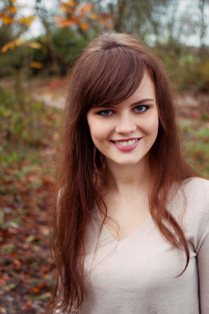 smiling-brunette-in-woodland