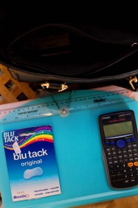 Blu tack pictured with calculator