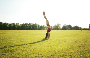 Teen blogger doing handstand