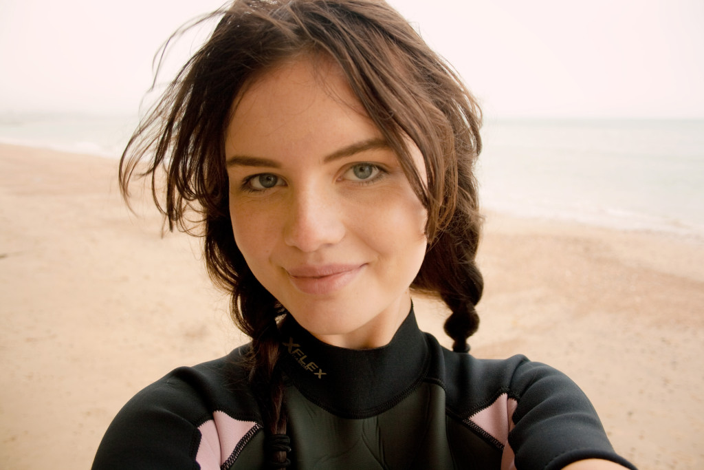 girl-wearing-wetsuit-on-weymouth-beach