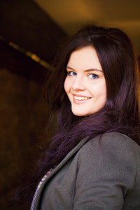 Teen girl wearing olive gren winter coat