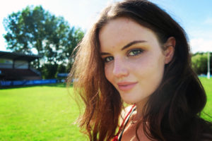 Teen girl photographed at rugby pitch