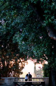 Yong couple in garden in Rome Italy