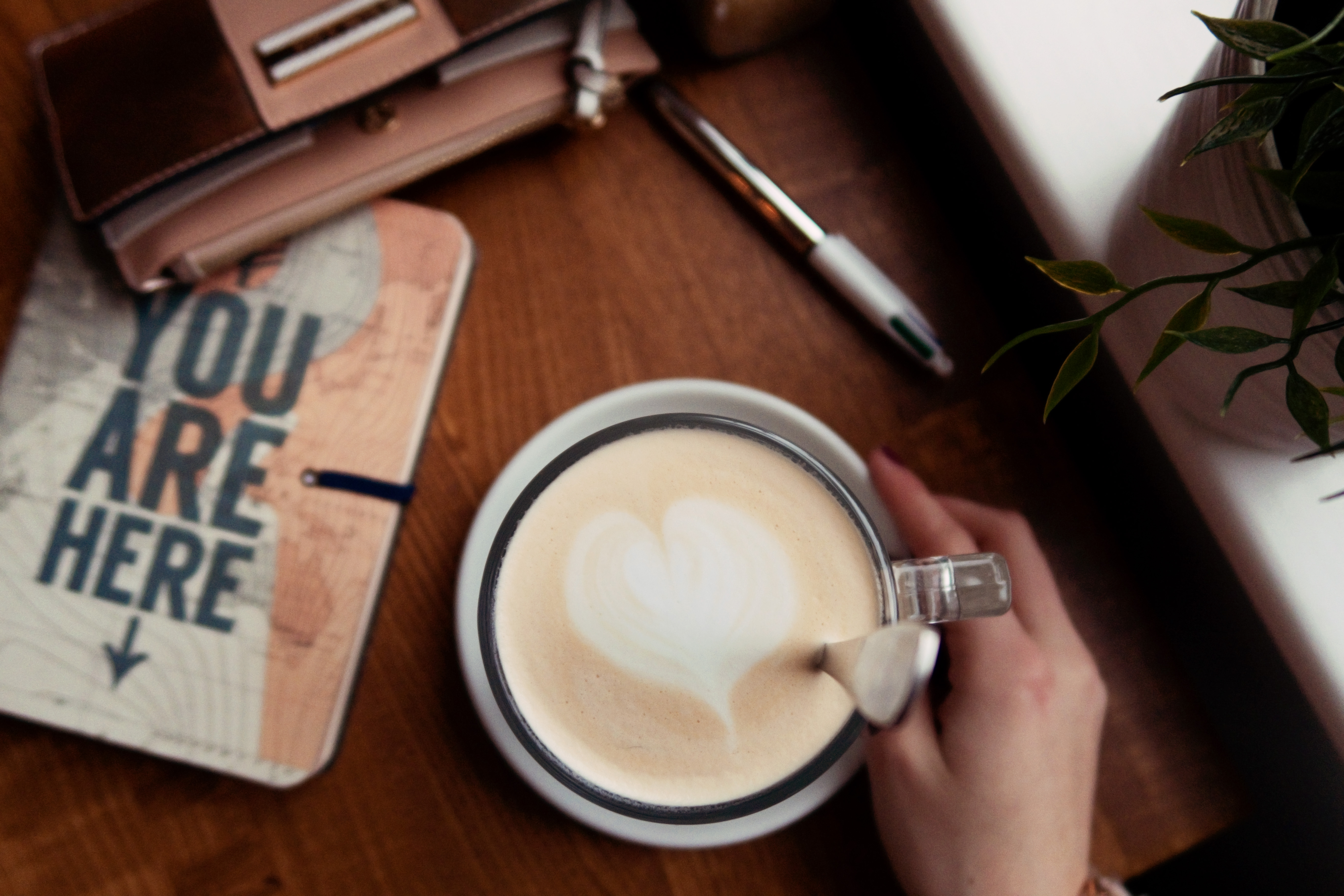 Heart shaped latte art on coffee.