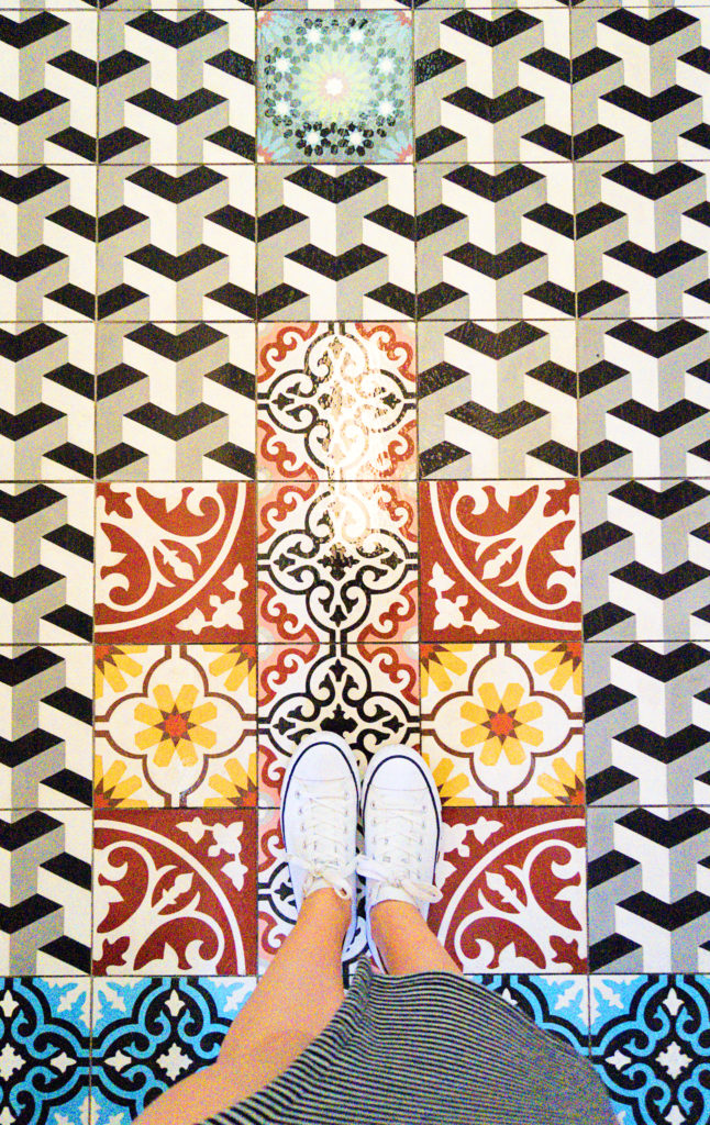 Geometric patterned floor tiles