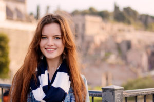 Smiling female tourist in Rome Italy.