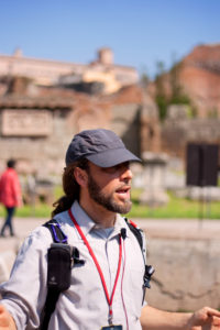 Bearded male with blue cap. Tour guide Rome Italy.