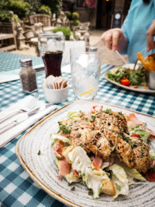 Chicken salad platter on check tablecloth